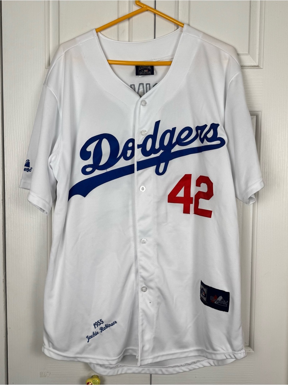 Dodgers White Baseball Jersey with Blue Script and Red Number 42